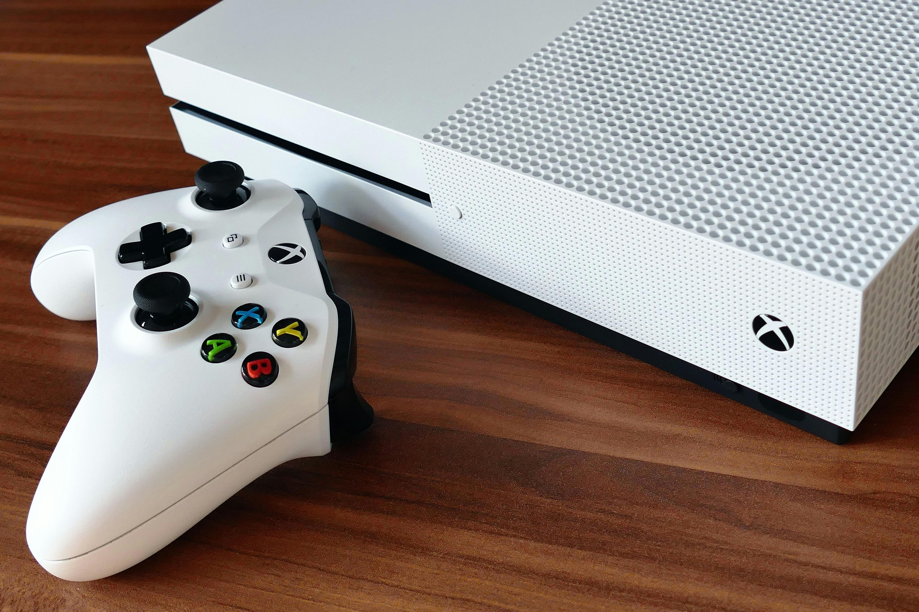 White Xbox with controller.